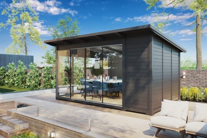 Modern grey garden house with sliding glass doors